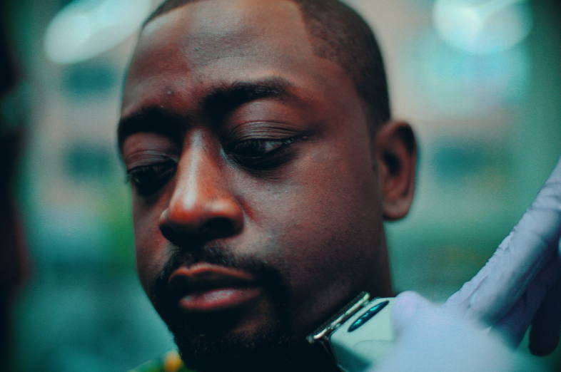Client in the chair during a line up at RDH Barbers, a Black barbershop in Toronto